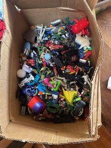 Box of figures and cars