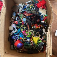 Box of figures and cars