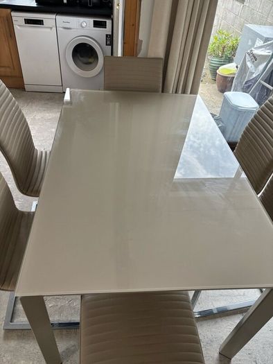 Extending dining table and chairs for sale