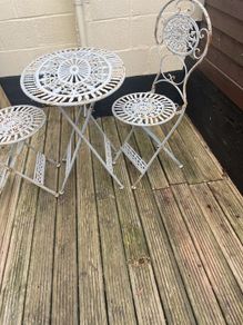garden table and two chairs