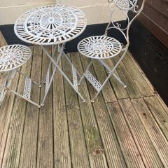 garden table and two chairs