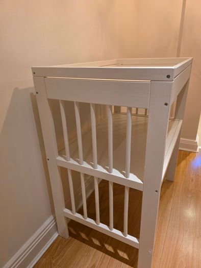 sleigh-style  baby crib and changing table