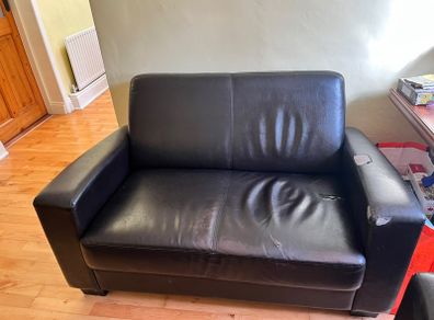Two Black Leather 2-Seater Couches