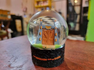 Jurassic Park gates snowglobe