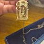 Vintage gilded bird cage with a bird pendant. Image 9