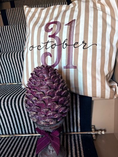 New bespoke oversized autumn Pinecone on distressed wood base in mulberry
