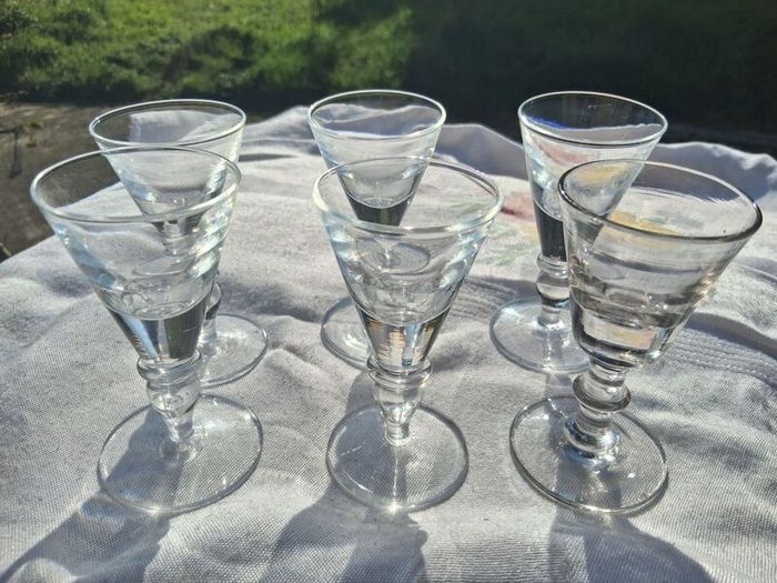 A Set of Cumbria Ware Hand Blown Toasting Glasses