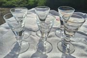 A Set of Cumbria Ware Hand Blown Toasting Glasses