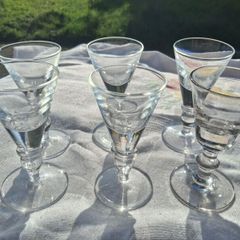 A Set of Cumbria Ware Hand Blown Toasting Glasses