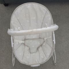 Baby bouncer with vibration and music