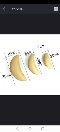 Crescent shaped pillows for newborn photoshoots