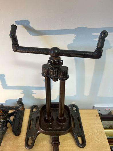 Two vintage rain king cast iron sprinklers