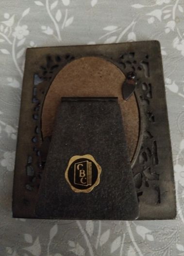Metal Frame with figurine