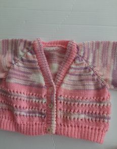 New childs pink short cardigan