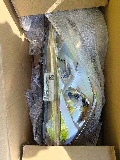 Toyota aqua driver-side headlight