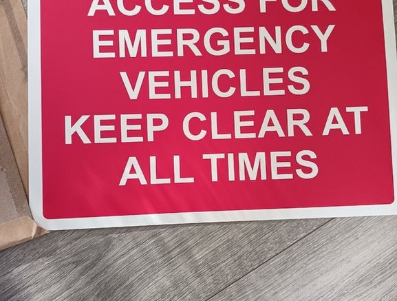 Emergency vehicle access sign board