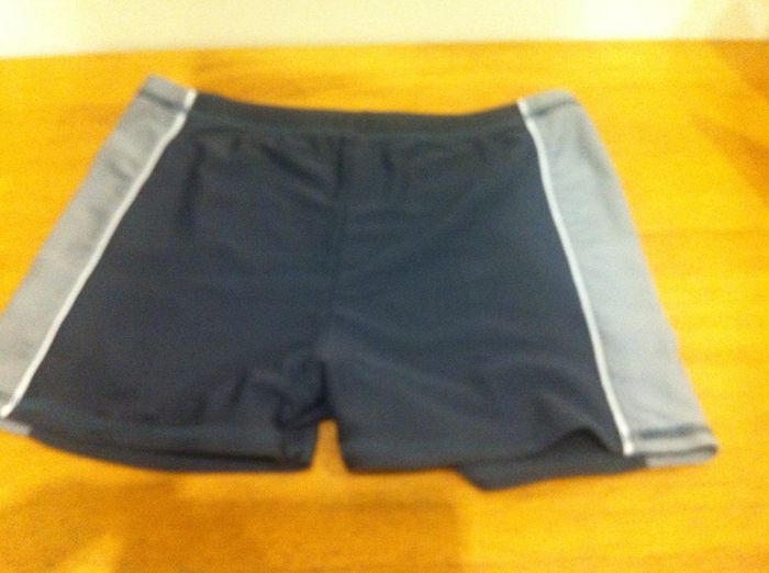 Two pairs of Boys swimming trunks, aged 9-10 years.