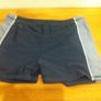 Two pairs of Boys swimming trunks, aged 9-10 years. Image 2