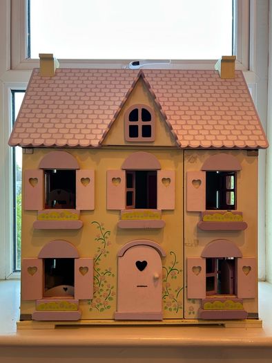 Large wooden dolls house