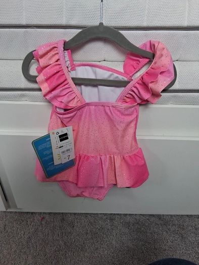 Brand New with tags Pink glitter Tutu style swimsuit age 9-12 months