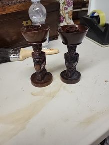 African candle holders carved