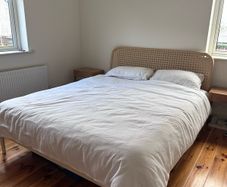 King bed with rattan and steel frame and mattress - IKEA