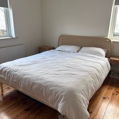 King bed with rattan and steel frame and mattress - IKEA