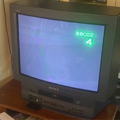 The Sony Trinitron KV-21V6U is a vintage 21-inch CRT color television combined with a built-in Video Cassette Recorder (VCR), WORKING