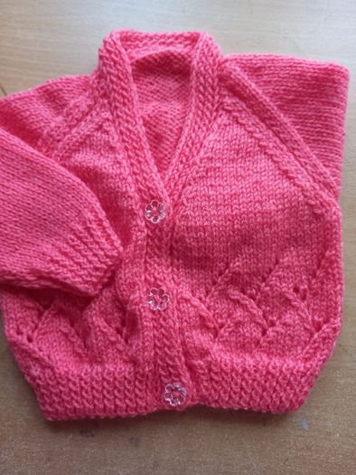 Beautiful hand knitted baby cardigans