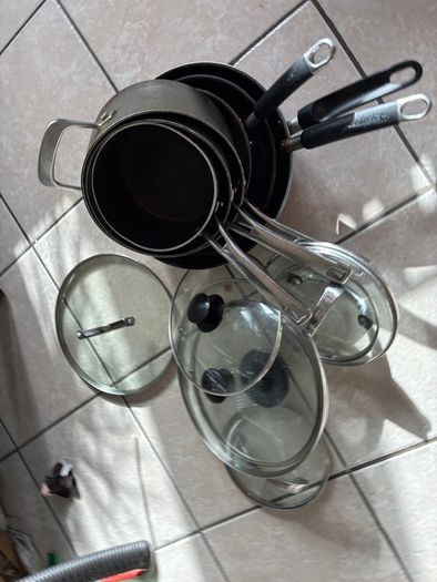 Set of saucepans, frying pan and wok