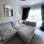 L-shape couch with footstool Image 9