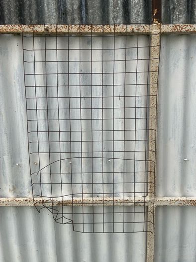 6 wire plant holders and 2 lawn plant protectors