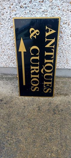 Antiques & Curios,hard plastic sign perspex. ,unusual and lovely colours,,32 inches length, 16 inches height,,buyer collects, see pictures for condition, used condition few marks nicks