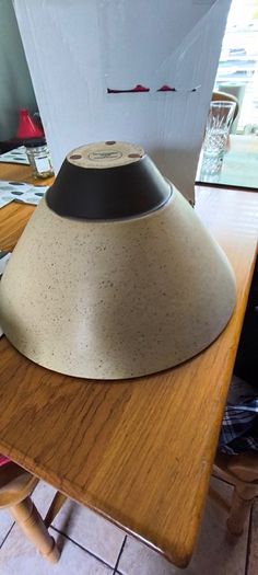 Large Angular Beige speckled ceramic bowl with a wide conical flare and a dark brawn contrasting base By Paul Costelloe.