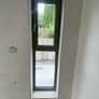 Triple Glazed Cement Grey Tilt and turn Window Image 3