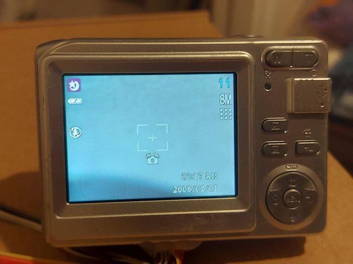 Z880 Digital Camera, Takes 2AA Batteries, working fine, has a modification that doesn't affect its performance