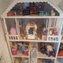 Dolls house with dolls Image 3