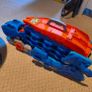 Hot Wheels T-Rex Garage + Transporter + Cars Image 4
