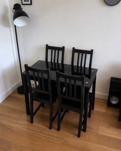 Black table with 4 matching chairs