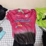 2 cycling shirts 1 is cube worth easily 50 euro and is brand new and pants with padding for on the saddle brand new never worn the second shirt is the official astana team training shirt also brand new  is the  would like to sell all together for a good p Image 2