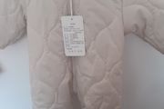 New unisex snow suit beigh with brown fur lining .Never worn size 0-3 months