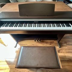 Casio Celviano Digital/Electric Upright Piano in Rosewood with Bench
