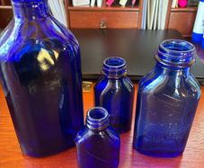 Antique bottles milk of magnesia