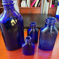 Antique bottles milk of magnesia