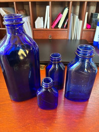 Antique bottles milk of magnesia