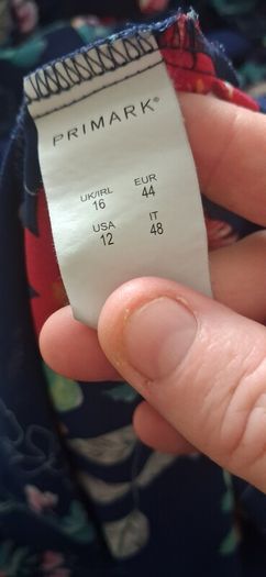 top says size 16 more 14