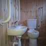 Disabled toilet, sink and handrails Image 2