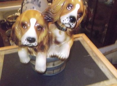 a vintag ornament off two  dogs