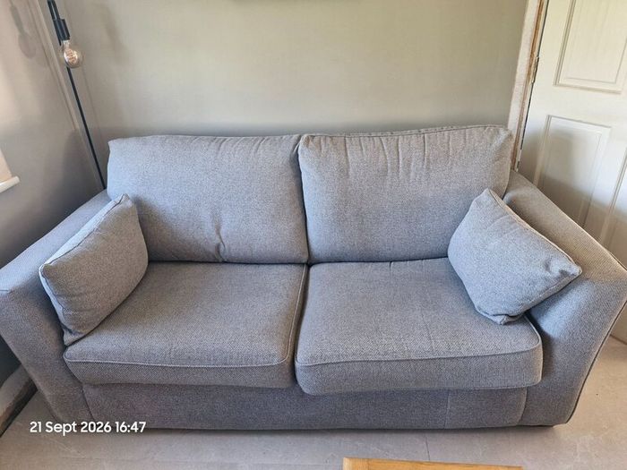 Two Light Grey  3  Seater Sofas + 2 Footstools