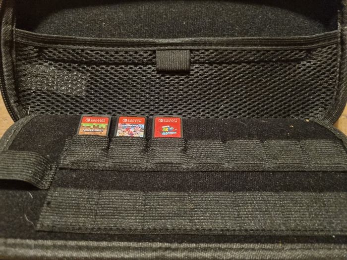 Nintendo Switch Standard Bundle + Case & 3 Top Games (Mario, Minecraft)